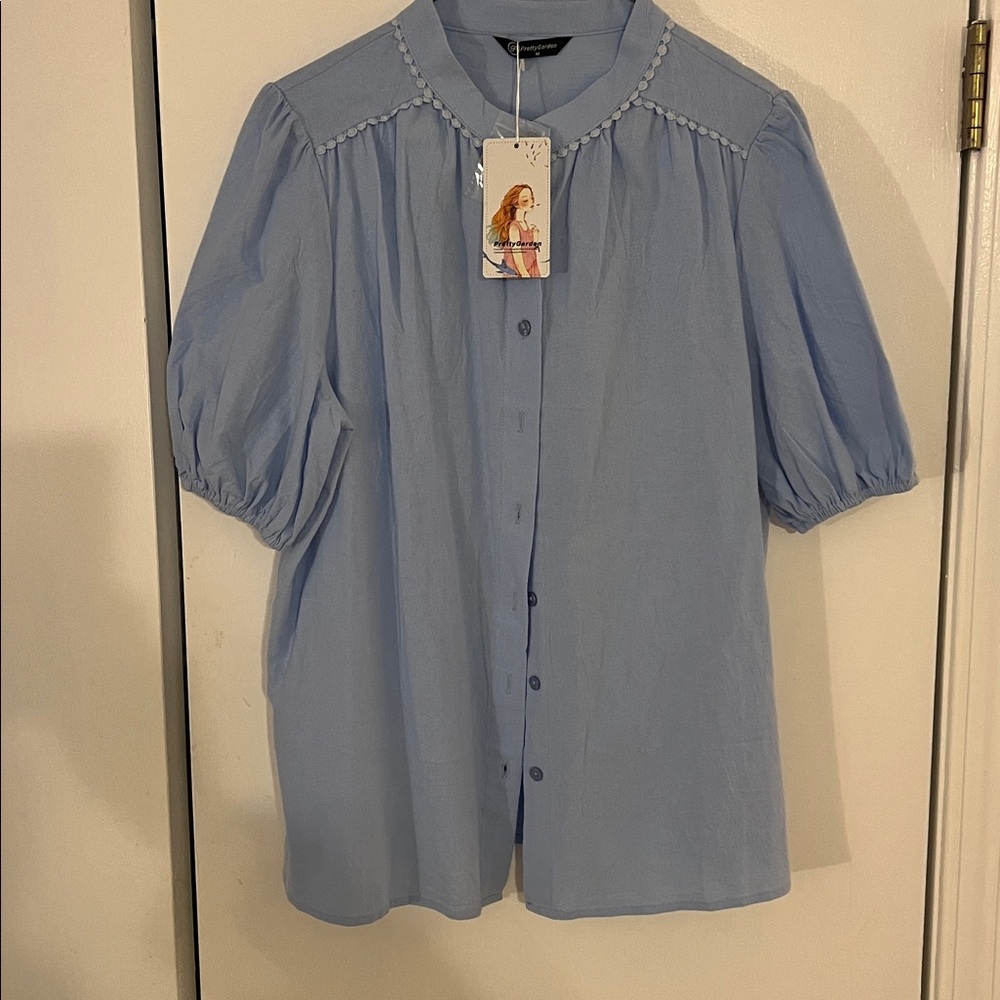 NWT Pretty Garden MEDIUM. Baby blue. Looks great with blue jeans or skirt.